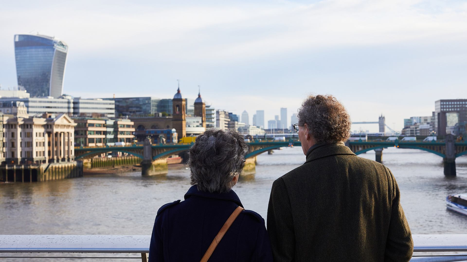 Older couple looking onto a river